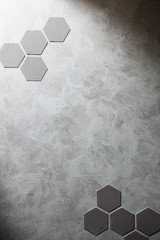 gray stylish grunge cement wall textured background with decorative elements over surface - 328573142