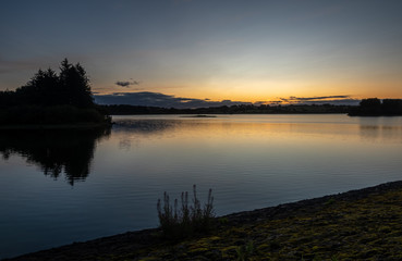 Fototapeta na wymiar View of sunrise at Barcraigs Reservoir, North Ayrshire, Scotland