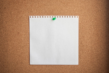 Fototapeta premium white paper on cork background