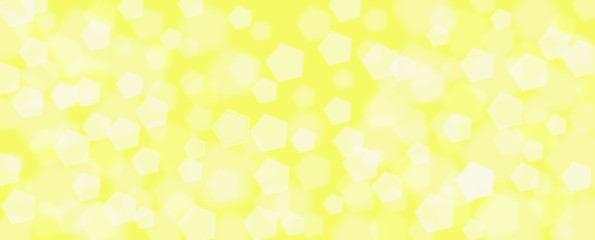 Abstract yellow bokeh banner background - birthday, father's day, valentine's day panorama - blurry bokeh circles on a yellow background.