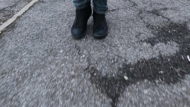 Feet walking on the street
