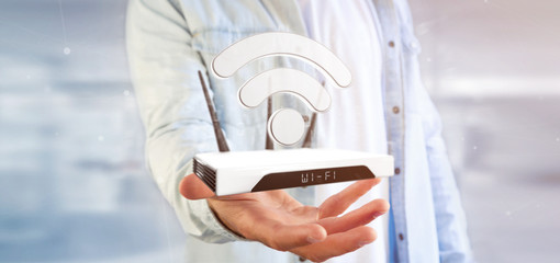 Businessman holding a Wifi router and data - 3d rendering