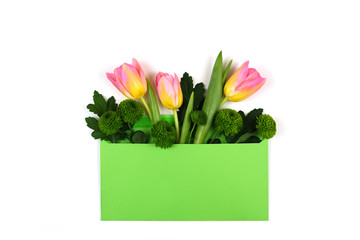 Envelope with flowers on a white background
