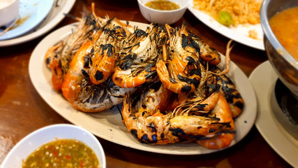 Grilled river prawn steak with seafood sauce