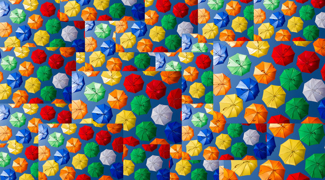 Abstract collage with colored umbrellas on a blue background