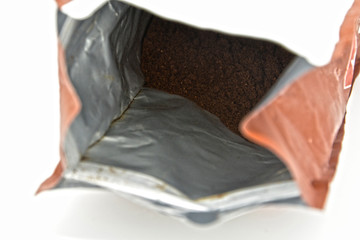 Brazilian ground coffee in a pack on a white background