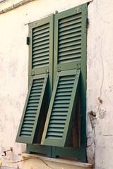 Beautiful Green shuttered windows in Italy.