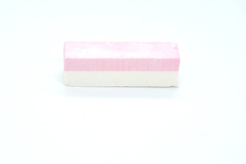 tasty pink and white pastille on the background