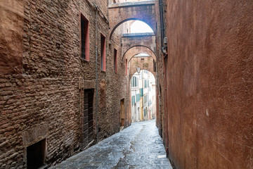 Arched street in mediterranean town, Europe