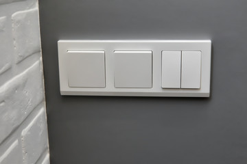 white light switch on grey background, interior, style