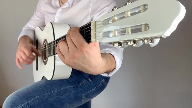 man in white shirt plays six-string classical guitar at home, concept art