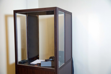 interpreting - Microphone and switchboard in an simultaneous interpreter booth . Soft focus of...