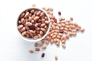 Raw bean grains (Phaseolus vulgaris) displayed in bowl