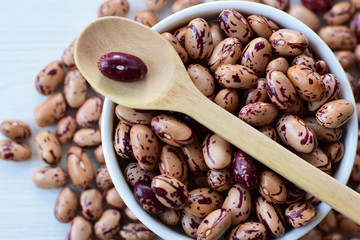 Raw bean grains (Phaseolus vulgaris) displayed in bowl