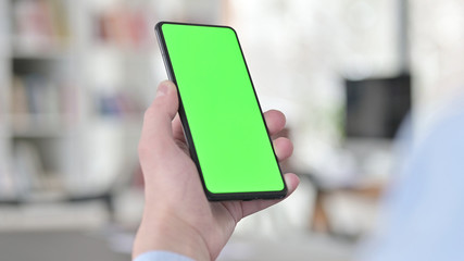 Man Holding Chroma Key Smartphone Screen