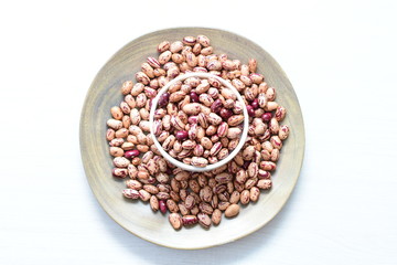 Raw bean grains (Phaseolus vulgaris) displayed in bowl