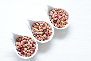 Raw bean grains (Phaseolus vulgaris) displayed in bowl