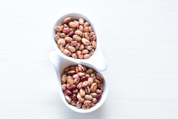 Raw bean grains (Phaseolus vulgaris) displayed in bowl