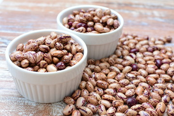 Raw bean grains (Phaseolus vulgaris) displayed in bowl