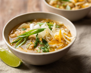 Vegetarian White Bean Chili Bowl with Scallions and Lime