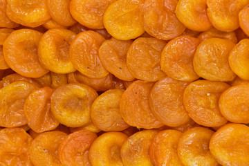 Background and texture of dried apricots.
