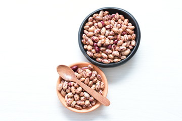 Raw bean grains (Phaseolus vulgaris) displayed in bowl