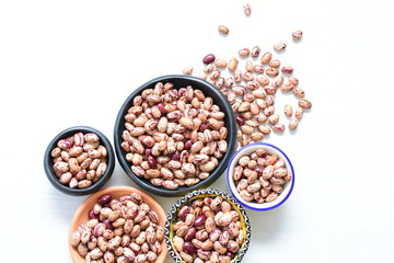 Raw bean grains (Phaseolus vulgaris) displayed in bowl