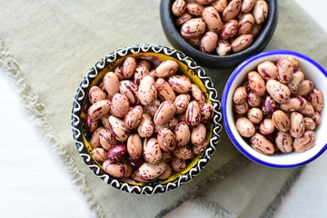 Raw bean grains (Phaseolus vulgaris) displayed in bowl