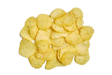 Fluted chips with spices on a white background. Isolated. Top view.