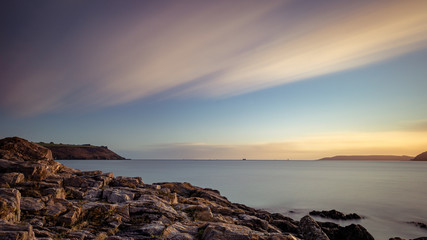 sunset on coast of sea