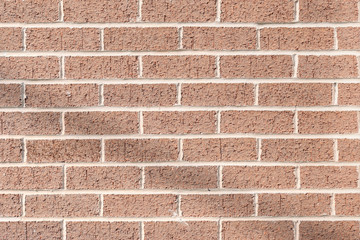 weathered brick wall textured close up background