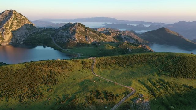Picturesque landscape of highland Lakes of Covadonga within Picos de Europa National Park at sunset