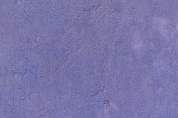 Purple stucco wall. Violet plaster backdrop, copy space