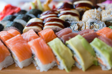 Sushi Set. Maki and rolls with tuna, salmon and avocado. National Japanese food. Close-up
