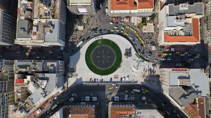 Aerial photo of recently renovated fountain of famous round square of Omonia in the heart of Athens centre, Attica, Greece