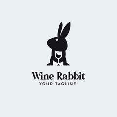 creative logo rabbit bring wine in negative style