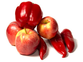 Wonderful red apple and red pepper isolated on a white background