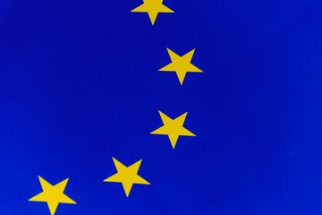A close-up shot of the European Union paper flag yellow stars