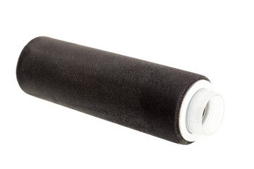 filter for purification and reducing the salt content in drinking water, a black replacement cartridge lies on its side isolated on a white background.