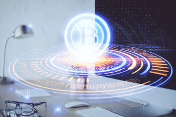 Multi exposure of blockchain and crypto economy theme hologram and table with computer background. Concept of bitcoin cryptocurrency.