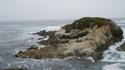 waves crashing on rocks