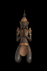 Bronze Buddha statue isolated on black background. Sign for peace and wisdom
