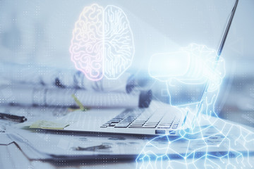 Fototapeta premium Computer on desktop with AR theme icon. Multi exposure. Concept of augmented reality.