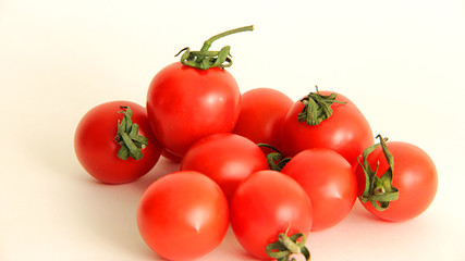 fresh cherry tomatoes on white background