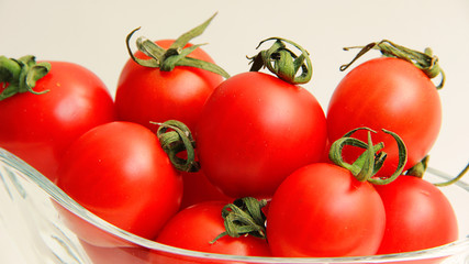 fresh cherry tomatoes on white background
