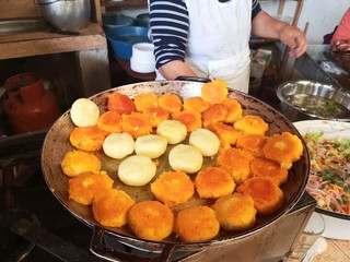 A very typical dish from Ecuador, called tortitas, and made of potatoes