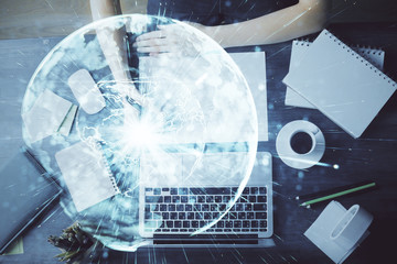 International business hud over woman's hands writing background. Concept of hard work. Double...