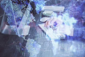 Double exposure of financial graph with man works in office on background. Concept of analysis.