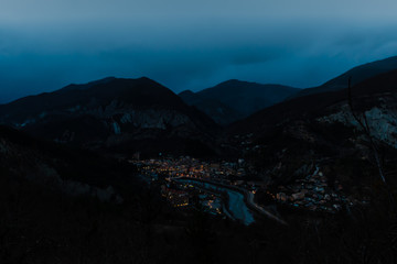 The panoramic view of a medieval French village Puget-Theniers in the dusk