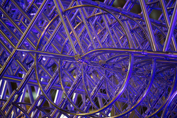 Bicycle’s wheel illuminated by a blue light